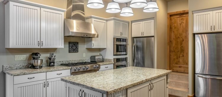 Color photo of a beautiful modern kitchen.