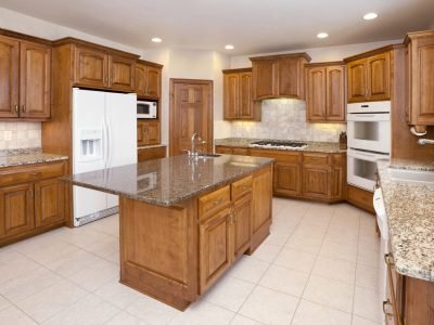 Dream Kitchen With Granite Counters, Hardwood Cabinetry, Custom Lighting