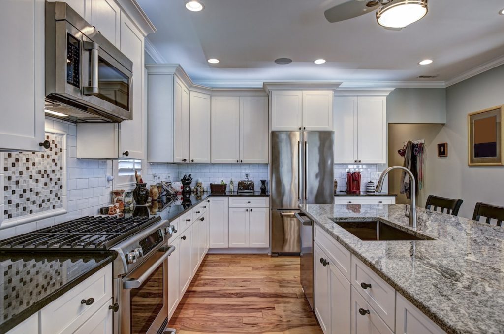 large american kitchen with granite countertops