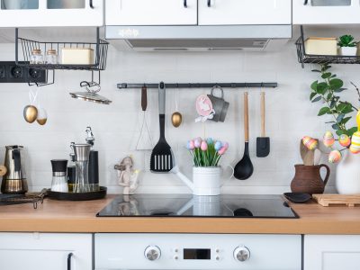 A well-organized kitchen featuring modern appliances and charming Easter decorations, creating a festive and cheerful atmosphere.