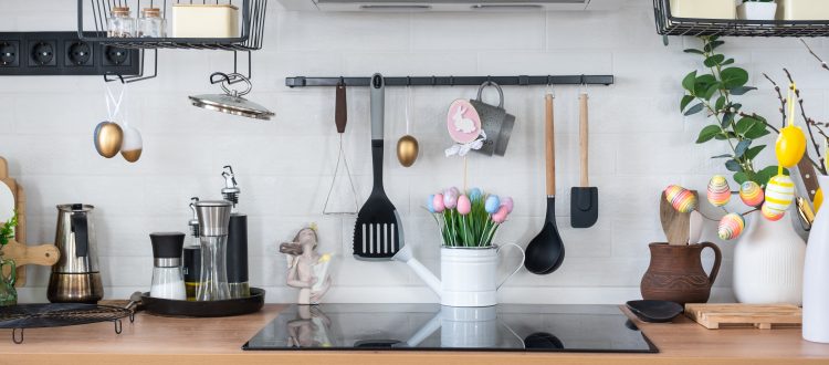 A well-organized kitchen featuring modern appliances and charming Easter decorations, creating a festive and cheerful atmosphere.