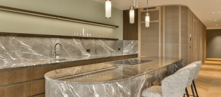 Marble kitchen island with pendant lights